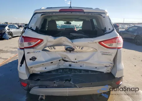 2014 Ford Escape Titanium z USA, uszkodzony, nr VIN 1FMCU0JX0EUB97700